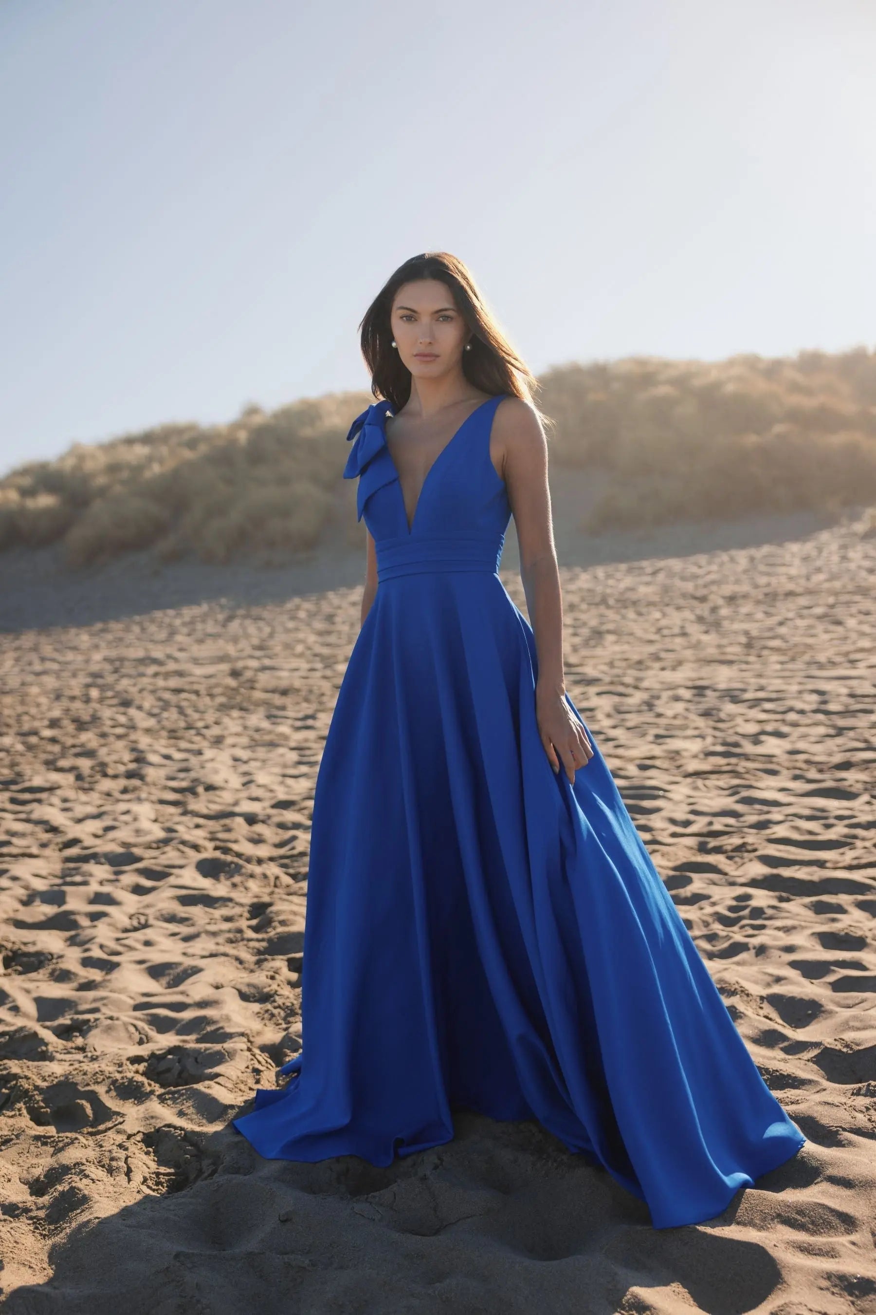 Blue Sleeveless Plunge Neck Crepe Ballgown With Bow Detail